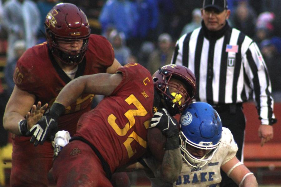 Junior running back David Montgomery carries the ball during the game against Drake University Dec. 1 at Jack Trice Stadium. The Cyclones won 27-24.
