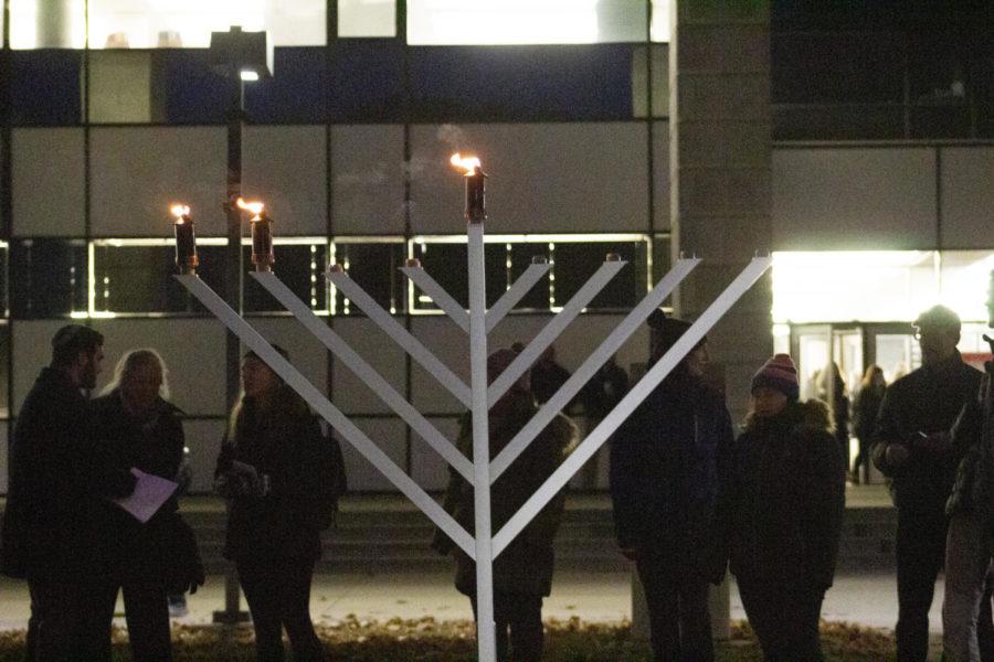 Members+of+the+Ames+Jewish+community+and+Chabad+on+Campus+watch+the+menorah+lighting+on+the+front+lawn+of+Parks+Library+on+Dec.+3.+Chabad+on+campus%2C+hosted+the+menorah+lighting+and+a+Chanukah+party+in+Carver+Room+400.