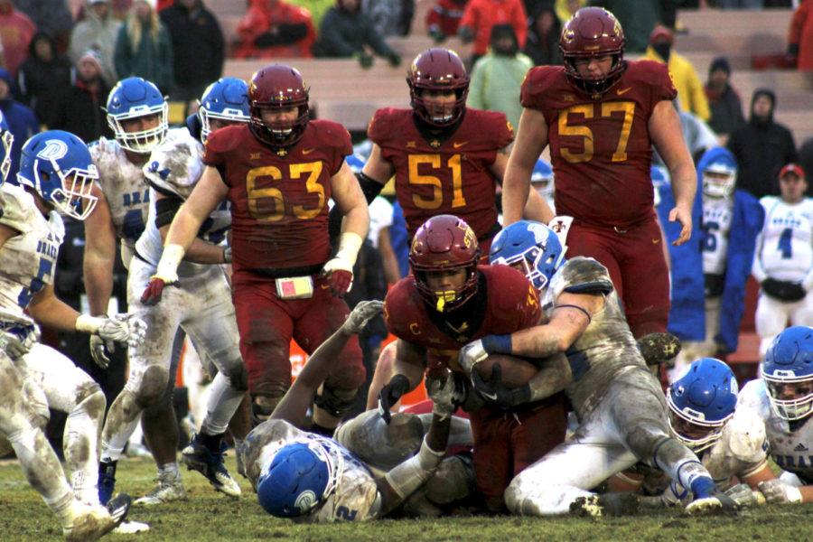 Junior running back David Montgomery holds on to the ball during the game against Drake University at Jack Trice Stadium on Dec. 1. The Cyclones won 27-24.