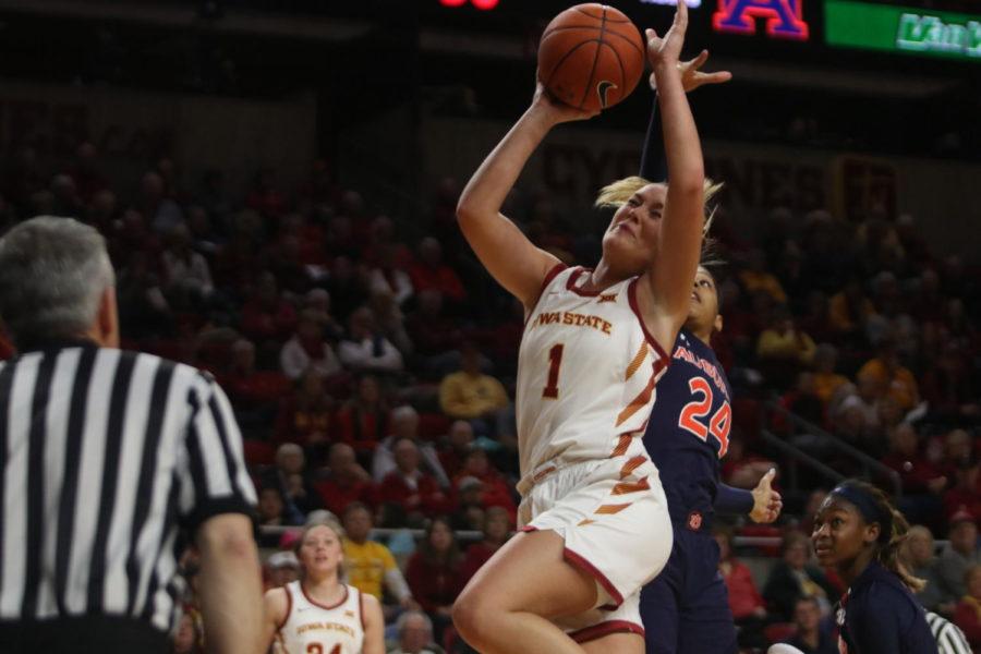 Sophomore forward Madison Wise attempts a shot during the game against Auburn at Hilton Coliseum on Nov. 13. The Cyclones won the semifinal game 67-64 of the WNIT (Women’s National Invitation Tournament) tournament.