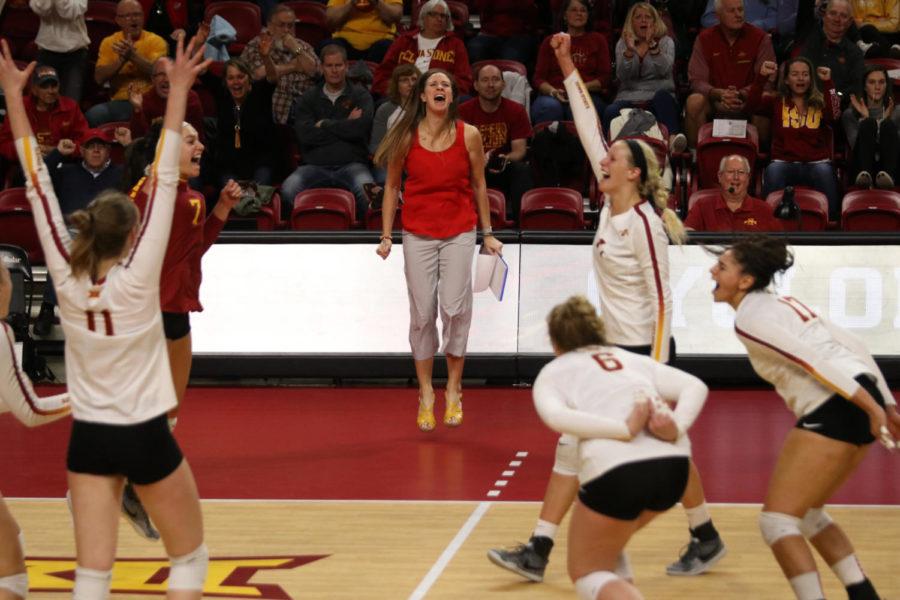Members of the Iowa State volleyball team celebrate scoring a point during their game against Kansas State at Hilton Coliseum on Oct. 26. The Cyclones won 3-1.