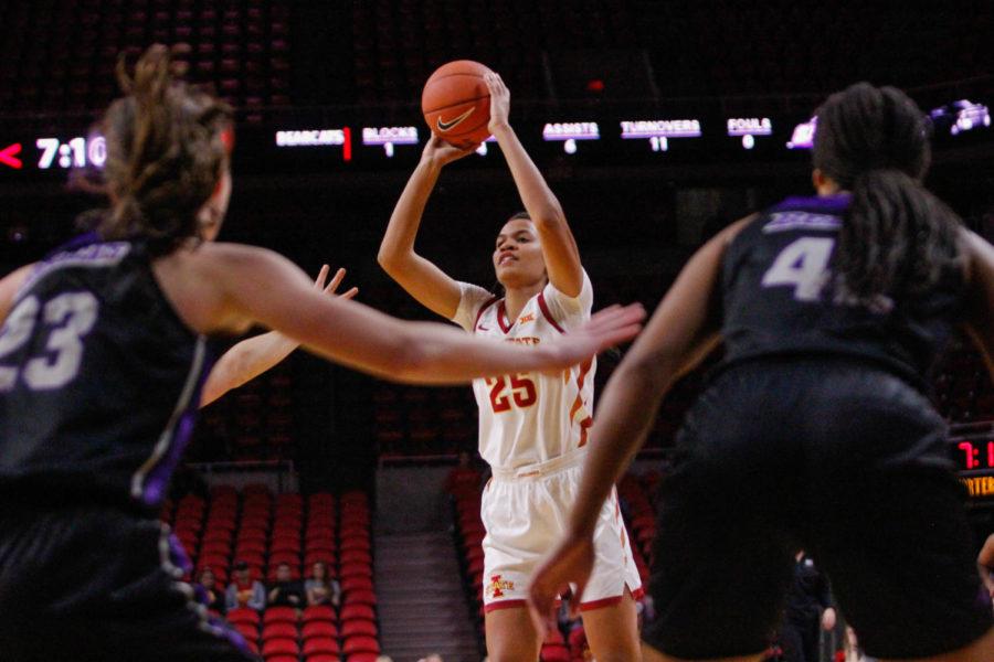 Sophomore Kristin Scott takes a shot against the Bearcats during the game against Southwest Baptist University on Nov. 1 at the Hilton Coliseum. The Cyclones won 90 to 51. 