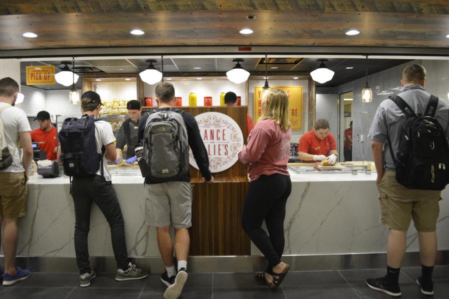 Students+order+their+food+in+the+newly+renovated+Memorial+Union+food+court+on+Aug.+21+at+Lance+and+Ellies.+After+renovations+throughout+the+summer%2C+the+Memorial+Union+food+court+features+a+modern+layout+with+new+menu+options+for+students.