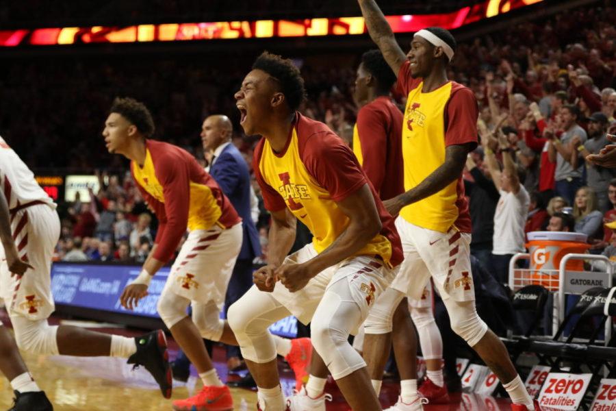 The Iowa State bench celebrates a made shot during the second half of the Cyclones 77-60 win over Kansas.