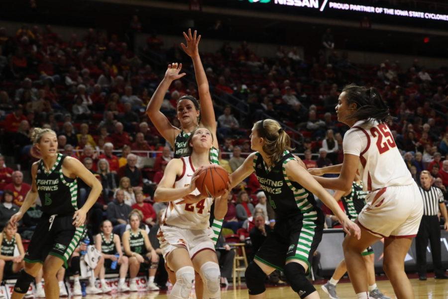 Iowa+State+freshman+Ashley+Joens+takes+a+contested+shot+during+a+blowout+win+over+North+Dakota+on+Sunday.