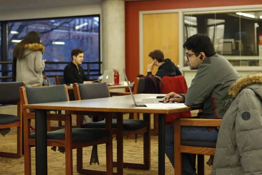 Rutwik Korde (right) is a sophomore in mechanical engineering. He often finds himself studying in the library alone among other students who are in study groups. Korde said international students can sometimes feel left out due to cultural differences.
