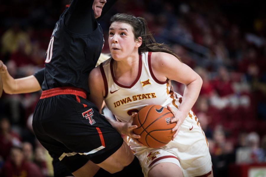 Guard Bridget Carleton drives to the hoop during the Iowa State vs Texas Tech womens basketball game Jan. 29 in Hilton Coliseum. The Cyclones defeated the Red Raiders 105-66.