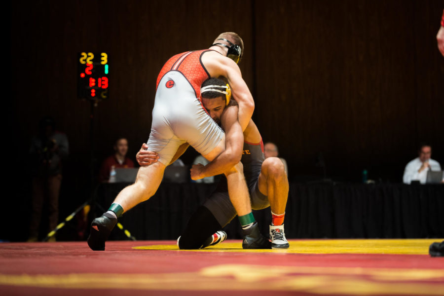 Freshman Marcus Coleman wrestles Kevin Gschwendtner durring the Iowa State vs SIU-Edwarsville match in Stephens Auditorium Nov. 11. The Cyclones won nine of the ten matches over the Cougars.