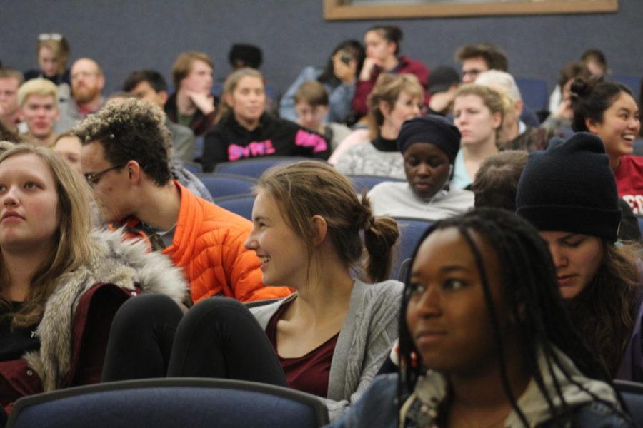 Students awaiting the screening of brand new film BlacKkKlansman at 7 p.m. Wednesday in Carver Hall. Over 100 students were in attendance for the showing. 