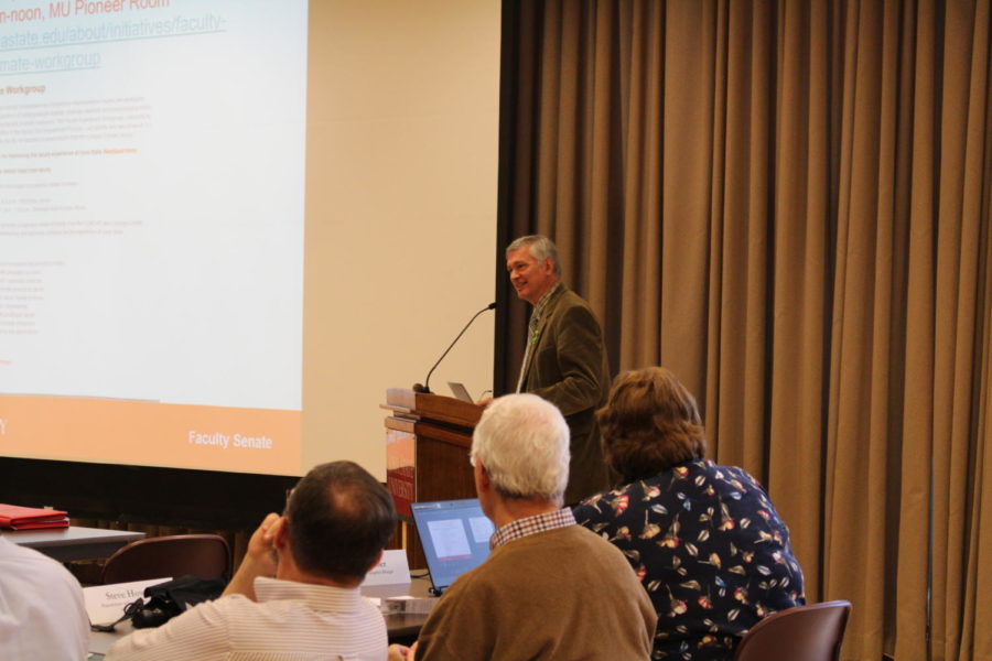 Peter Martin, university professor in the Department of Human Development and Family Studies, facilitates the meeting held in the Memorial Union on Oct. 9.