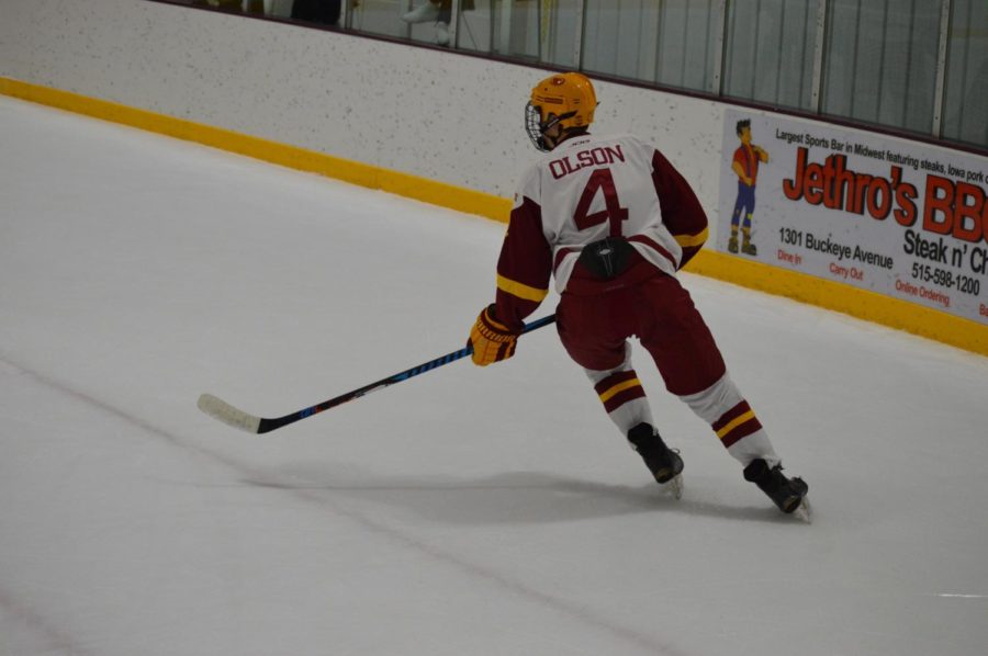 Max Olson, #4 on the Cyclone hockey team, plays defense at Friday nights game. The game was held at the Ames/ISU Ice Arena. The Cyclones won the game against Minot State with a final score of 3-1. 