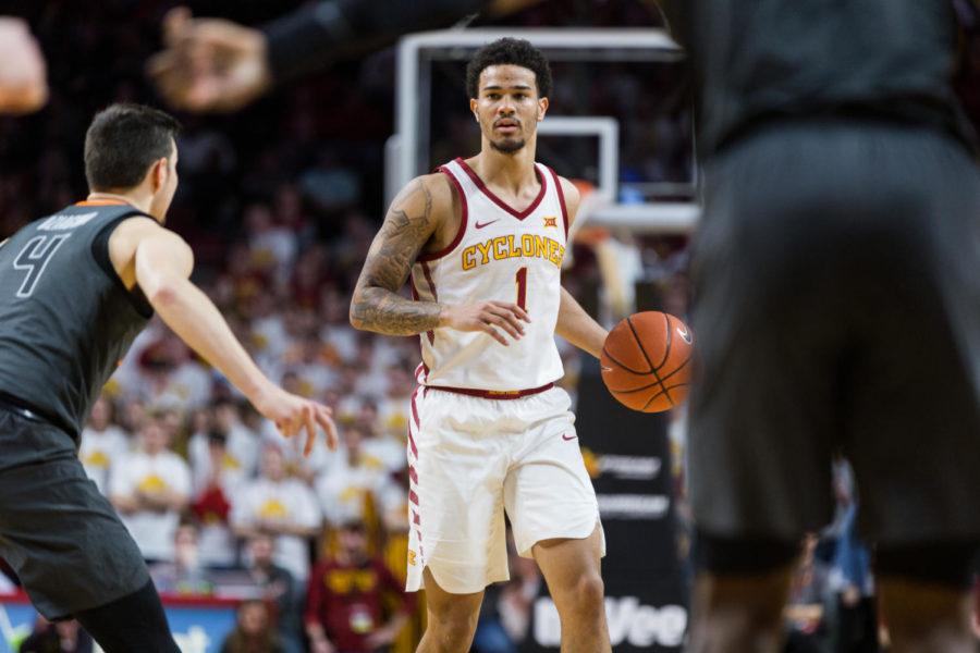 Senior guard Nick Weiler-Babb looks for an open pass during the Iowa State vs Oklahoma State basketball game on Jan. 19 in Hilton Coliseum. The Cyclones defeated the Cowboys 72-59.