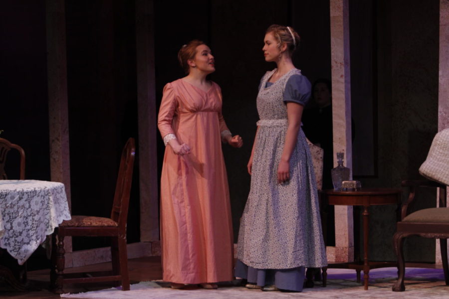 Erica Walling as Marianne Dashwood (left) and Olivia Griffith as Elinor Dashwood (right) perform during the play rehearsal for Sense and Sensibility on Feb. 20. Sense and Sensibility is a play filled with humor and emotional depth as the story follows sisters Elinor and Marianne who must learn to overcome societal pressures In order to find love and their place in the world. The play will be performed in Fisher Theater on Feb. 22, 23, and Mar. 1, and 2 at 7:30 p.m. and on Feb. 24, and Mar. 3 at 2 p.m.