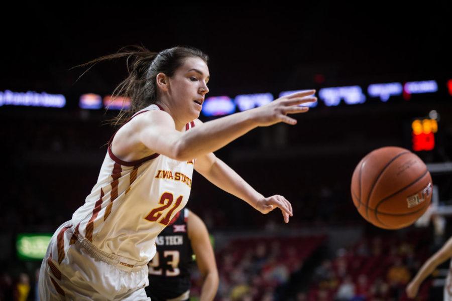Guard Bridget Carleton saves the ball from going out of bounds during the Iowa State vs Texas Tech womens basketball game Jan. 29 in Hilton Coliseum. The Cyclones defeated the Red Raiders 105-66.