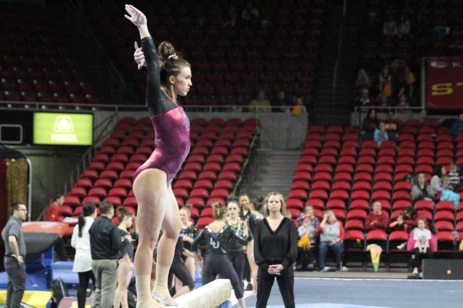 Iowa State Gymnastics senior Meaghan Sievers competes on beam, scoring a 9.800 and tying for first on balance beam for the Cyclones at the meet against Lindenwood University at Hilton Coliseum on Jan. 27.