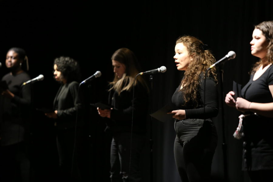 (left to right) Yasja Hemmings, a second-year masters student in the student affairs program, Adriana Le Compte, a senior in environmental science, Emily Qualizza, a junior in culinary food science, Sierra Shields, a freshman double majoring in psychology and criminal justice, and Gabriela Ampuero, a senior in political science, perform a monologue as part of the Vagina Monologues. The event was held Friday Feb. 15 in the Sun Room to raise funds for the anti-violence groups within the community.