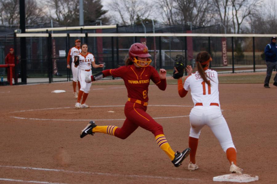 Iowa State junior Taylor Nearad lunges for first base during the Cyclones 11-4 loss to Texas.