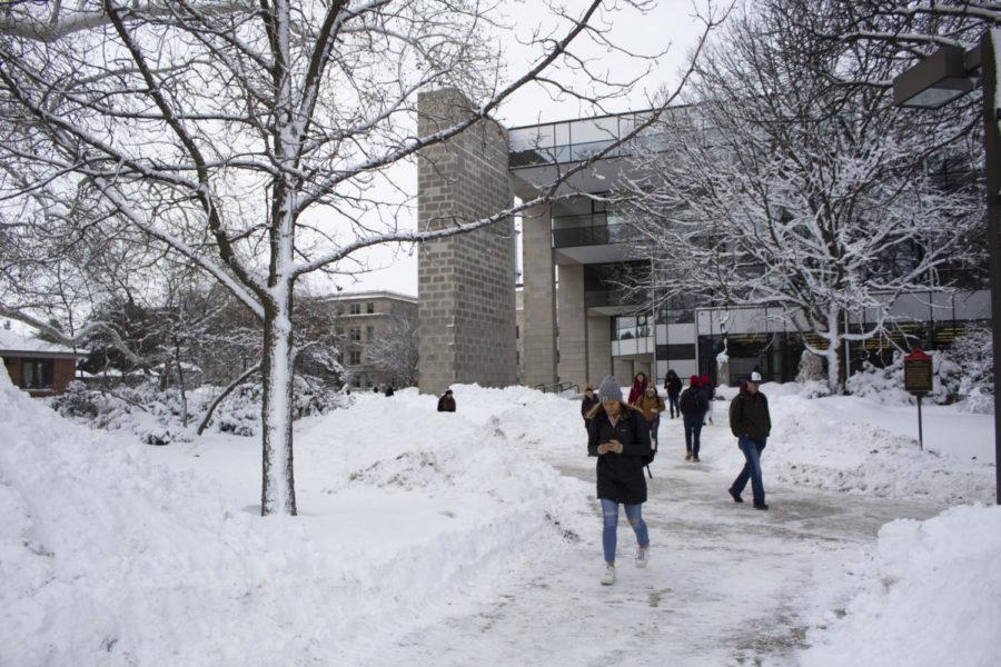 Students and faculty deal with frigid temperatures and a high of 10 degrees Monday. The weather during the weekend closed I-35 and Ames Public Schools, and trucks displaced from I-35 were allowed to park at Hilton Coliseum.