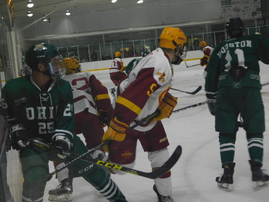 A group of Cyclones and Bobcats from Ohio University untangle themselves after the puck was shot to the other end of the rink during the game Oct. 19 at the Ames/ISU Ice Arena. Iowa State lost 4-1 after three well-fought periods.