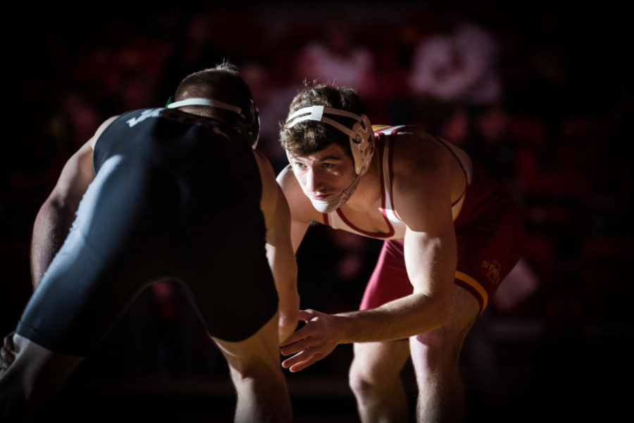 Then-redshirt+junior+Chase+Straw+faces+off+against+then-redshirt+freshman+Spencer+Heywood+for+the+first+match+of+the+Iowa+State+vs.+Utah+Valley+dual+meet+Feb.+3%2C+2019%2C+in+Hilton+Coliseum.+Straw+won+by+major+decision+4-0%2C+and+the+Cyclones+defeated+the+Wolverines+53-0.