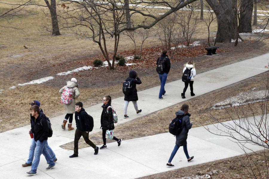 Iowa State students walk to class Feb. 4. After a weekend of temperatures around 40 degrees, the high for the day was 26 degrees and the low was 8 degrees.