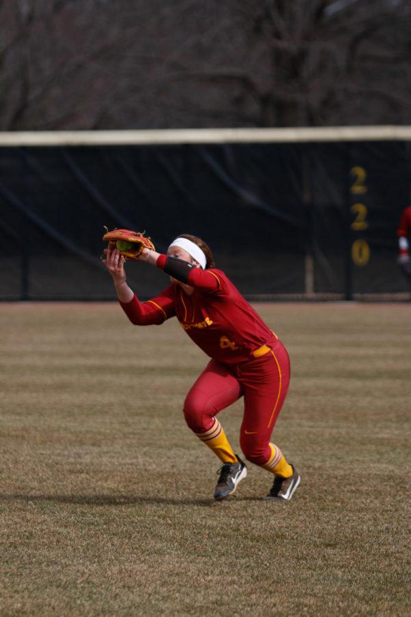 Iowa State second baseman Sydney Stites ranges into the outfield to snag a flyball during the Cyclones 11-4 loss to Texas at the Cyclone Sports Complex.
