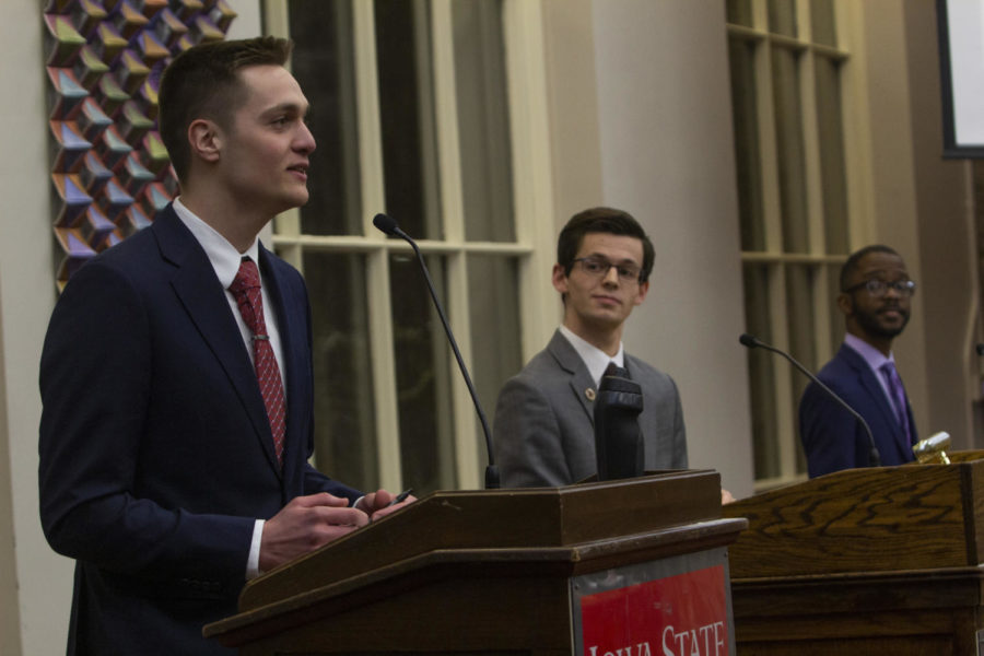 Senior in business economics Austin Graber (left) answers a question while senior in political science Cody Woodruff (middle) and junior in political Benjamin Whittington (right) listens. Graber’s campaign is “Elevate. Educate. Connect.” The Iowa State Student Government Presidential Debate was held in the Campanile Room of Memorial Union on Feb. 26.