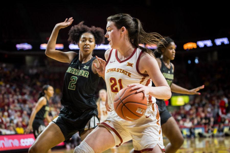 Iowa State senior guard Bridget Carleton is guarded by Baylor sophomore guard DiDi Richards during the first half of the Iowa State vs Baylor women’s basketball game held Saturday in Hilton Coliseum. The Lady Bears defeated the Cyclones 60-73 despite a surge from Iowa State in the second half.