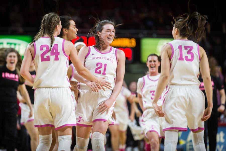 Iowa+State+senior+guard+Bridget+Carleton+is+congratulated+by+her+teammates+following+a+buzzer+beater+three+point+shot+to+end+the+first+half+of+the+Iowa+State+vs+Oklahoma+State+women%E2%80%99s+basketball+game+Friday+in+Hilton+Coliseum.+The+Cyclones+defeated+the+Cowgirls+89-67.