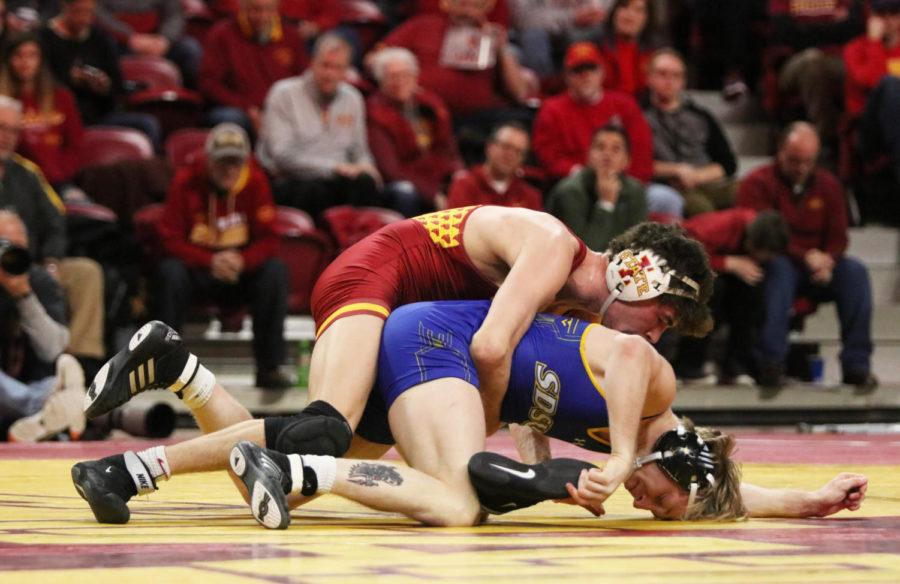 Iowa+State+then-redshirt+sophomore+Jarrett+Degen+takes+on+South+Dakota+State+junior+Henry+Pohlmeyer+as+a+part+of+the+149-pound+weight+class+during+the+third+period+of+their+match+at+Hilton+Coliseum+on+Feb.+1.+Degen+won+the+match+up.+The+Iowa+State+wrestling+team+won+47-0+against+South+Dakota+State.