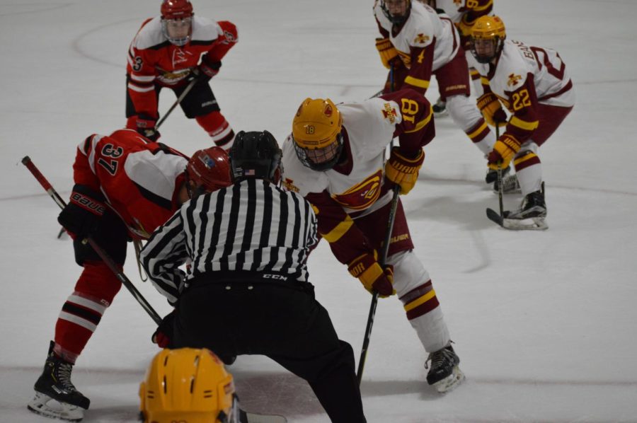 Cyclone Hockey gets ready for a faceoff against Minot State Friday night. The game was held at the Ames/ISU Ice Arena. The Cyclones won the game with a final score of 3-1. 
