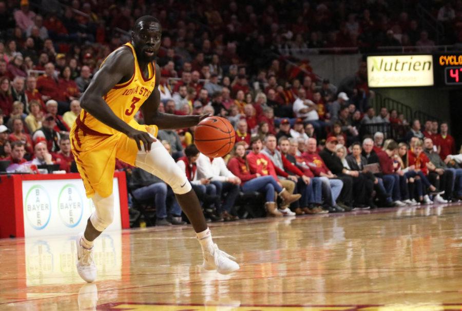 Iowa State redshirt senior Marial Shayok runs the ball down the court during the game against West Virginia at Hilton Coliseum on Jan. 30. The Cyclones won 93-68.