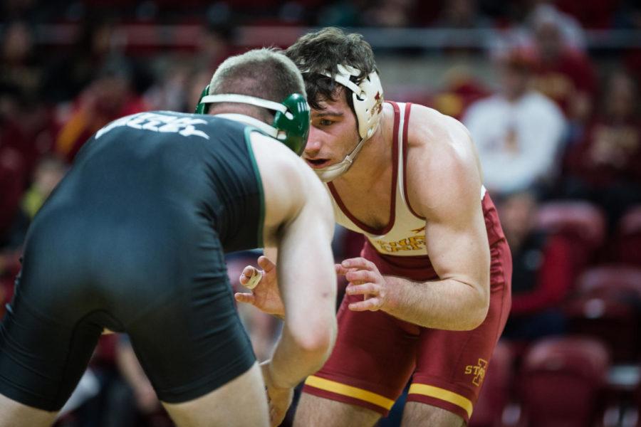 Utah+Valley+redshirt+freshman+Spencer+Heywood+gets+a+stall+warning+while+wrestling+redshirt+junior+Chase+Straw+during+the+first+match+of+the+Iowa+State+vs+Utah+Valley+dual+meet+Feb.+3+in+Hilton+Coliseum.+Straw+won+by+major+decision+4-0+and+the+Cyclones+defeated+the+Wolverines+53-0.