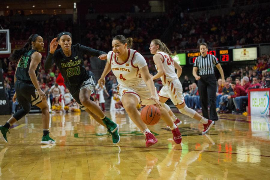 Then Sophomore Rae Johnson moves up the court during the Cyclones game against Baylor on Feb. 23 at the Hilton Coliseum. The Cyclones lost 60-73.