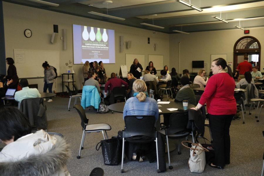 People gathered in Parks Library to discuss communication in relationships as a part of the Green Dot program on April 5. Different tables broke apart to talk about different scenarios and opinions throughout the meeting.