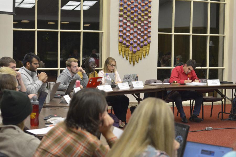 Members of Iowa State’s Student Government make their way through the night’s agenda during their meeting on Oct. 24 in the Campanile room of the Memorial Union. The meeting centered on funding for Latinx Initiatives, Rodeo Club, seating at-large members to the finance committee and confirming members to the election commission.