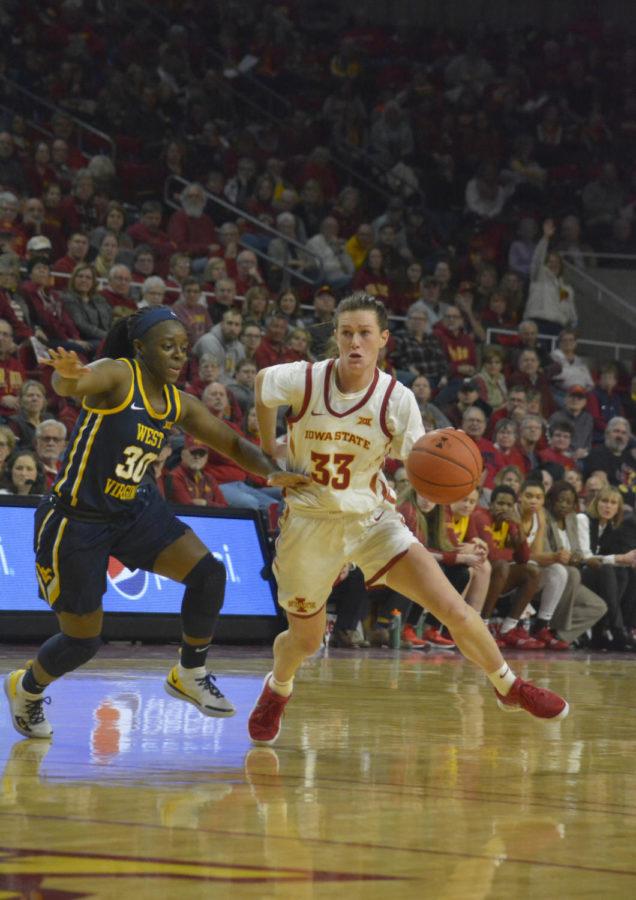 Iowa+State+redshirt+senior+Alexa+Middleton+defends+the+ball+from+West+Virginia+University+freshman+Madisen+Smith+in+the+first+quarter+of+the+game+at+Hilton+Coliseum+on+Feb.+9.+The+Cyclones+won+77-61+against+the+Mountaineers.
