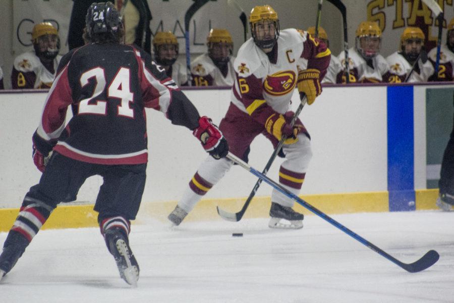 Nick Sandy, senior defenseman, handles the puck during the game against Illinois State.