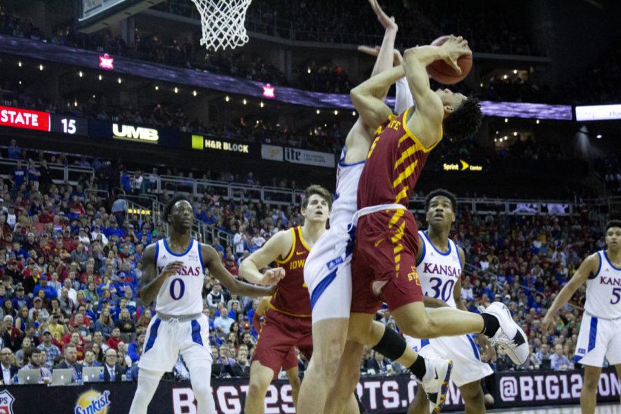 University+of+Kansas+junior+forward+Mitch+Lightfoot+fouls+on+sophomore+guard+Lindell+Wigginton+during+the+first+half+of+the+Big+12+Championship.+Wigginton+did+not+make+any+of+his+free+throw+shots.+Iowa+State+won+against+University+of+Kansas+on+March+16+at+the+Sprint+Center+in+Kansas+City%2C+MO.