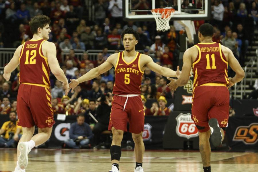 Iowa State sophomore Lindell Wigginton slaps hands with teammates Michael Jacobson and Talon Horton Tucker after a made shot during the first half against Baylor at the Big 12 Tournament.