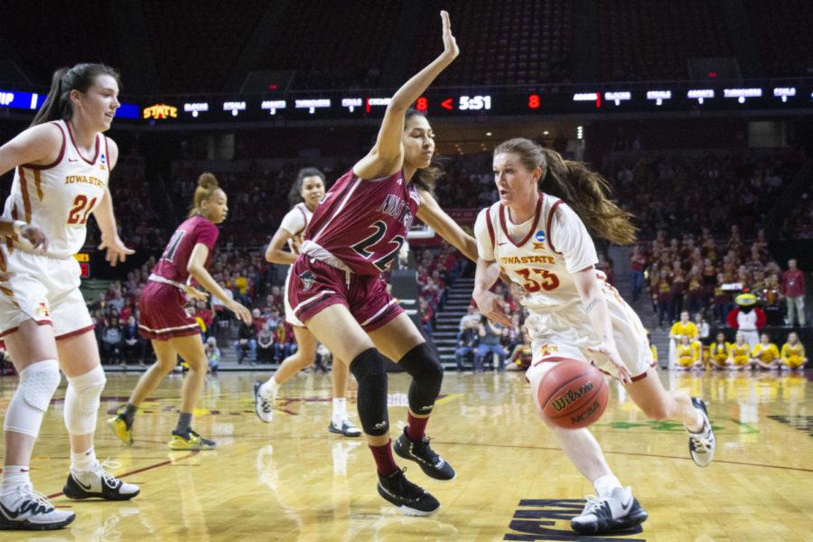 Redshirt senior guard Alexa Middleton passes the ball to sophomore forward Madison Wise for her to shoot a three pointer in the first quarter. Wise’s three put the Cyclones at 11-8 against the Aggies. The Iowa State women’s basketball team won against New Mexico State 97-61 during the first round of the NCAA Tournament held in Hilton Coliseum on March 23. The Cyclones will move on to play No. 11 seed Missouri State on Monday, March 25 in Hilton Coliseum.