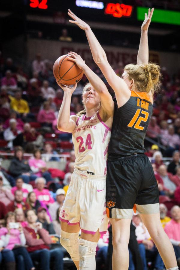 Iowa+State+freshman+guard+Ashley+Joens+is+blocked+while+going+for+a+basket+by+Oklahoma+State+sophomore+forward+Vivian+Gray+during+the+second+half+of+the+Iowa+State+vs+Oklahoma+State+women%E2%80%99s+basketball+game+held+Feb.+16+in+Hilton+Coliseum.+The+Cyclones+defeated+the+Cowgirls+89-67.