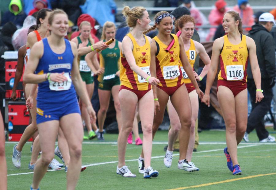 The Iowa State womens distance medley relay team walk across the field after placing eighth at the Drake Relays in Des Moines April 30.