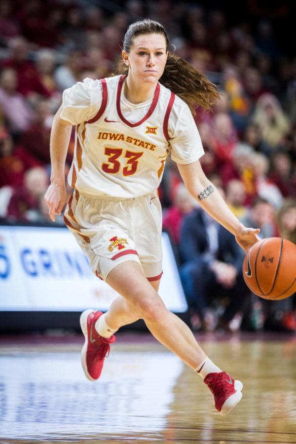 Iowa State redshirt senior guard Alexa Middleton dribbles down the court during the first half of the Iowa State vs Baylor women’s basketball game held in Hilton Coliseum Feb. 23. The Lady Bears defeated the Cyclones 60-73 despite a surge from Iowa State in the second half.