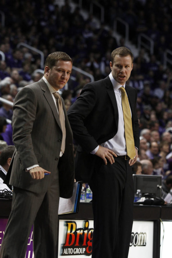Fred Hoiberg and ISU assistant coach T.J. Otzelberger talk on the sideline during the second half of Iowa States 65-61 win against Kansas State on Saturday, Feb. 25, 2012. Otzelberger will be the highest paid assistant coach on Steve Prohms staff for the 2015-16 season. 