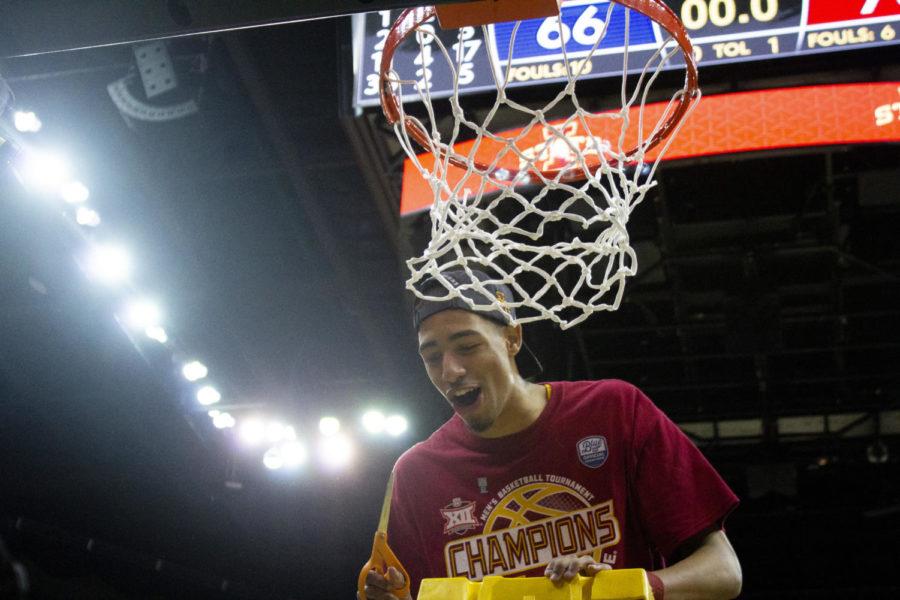 Freshman guard Tyrese Haliburton laughs after he dropped the part of the net he cut off. Players get to keep part of the net as a memento Iowa State won the Big 12 Championship 78-66 against University of Kansas on March 16 at the Sprint Center in Kansas City, MO.
