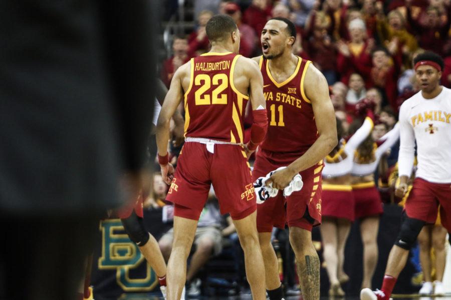 Iowa State freshman Talen Horton-Tucker celebrates with teammate Tyrese Haliburton after a made shot in the first half against Kansas State in the Big 12 Tournament.