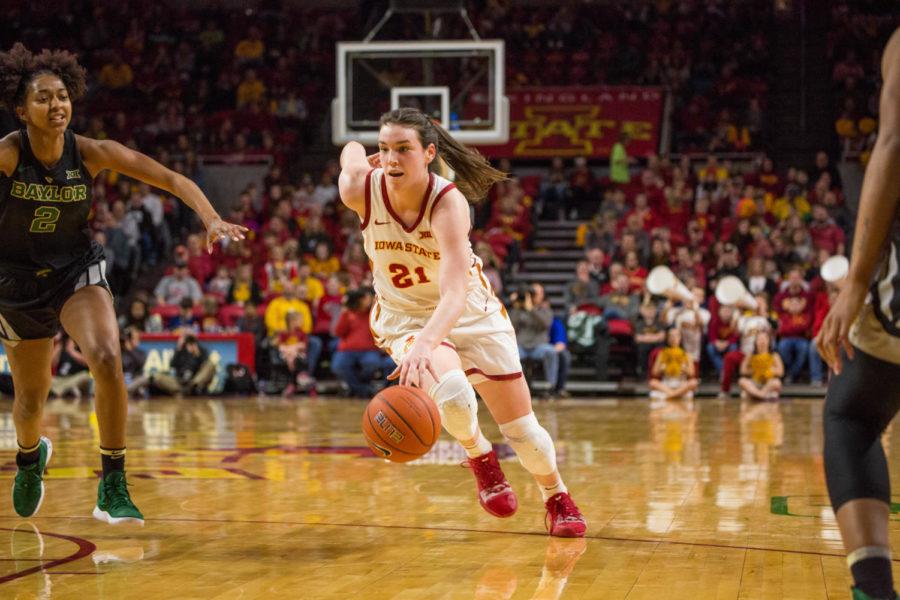 Senior Bridget Carleton moves down the court int Baylor territory during their game against the Bears on Feb. 23 at Hilton Coliseum. The Lady Bears defeated the Cyclones 60-73.