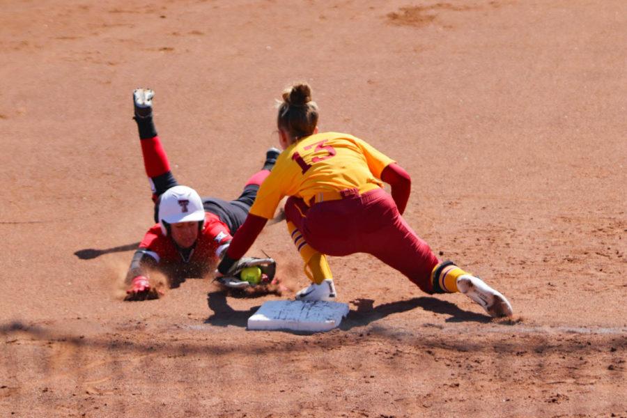 Third baseman Talyn Lewis, tags Texas Tech freshman Peyton Blythe as she tries to steal third in the sixth inning of Iowa States loss to Texas Tech. Iowa State lost to Texas Tech 8-4 on March 31, dropping their record to 18-15 overall and 1-5 in Big 12 play. 