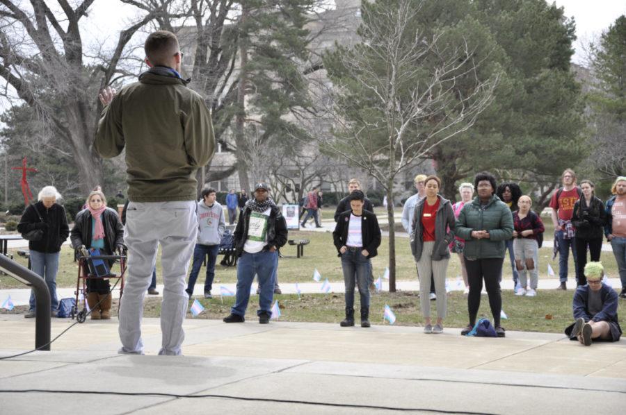 Brad Freihoefer, director of the Center for LGBTQIA+ Student Success, spoke in front of attendees and invited them inside Parks for a gallery walk.